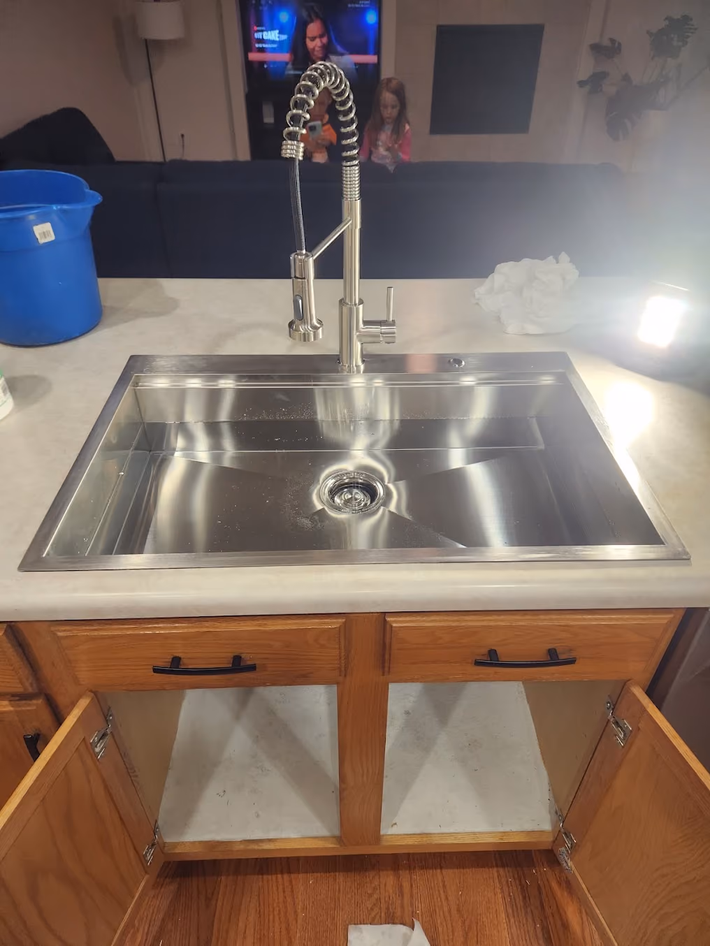 A stainless sink with a new faucet