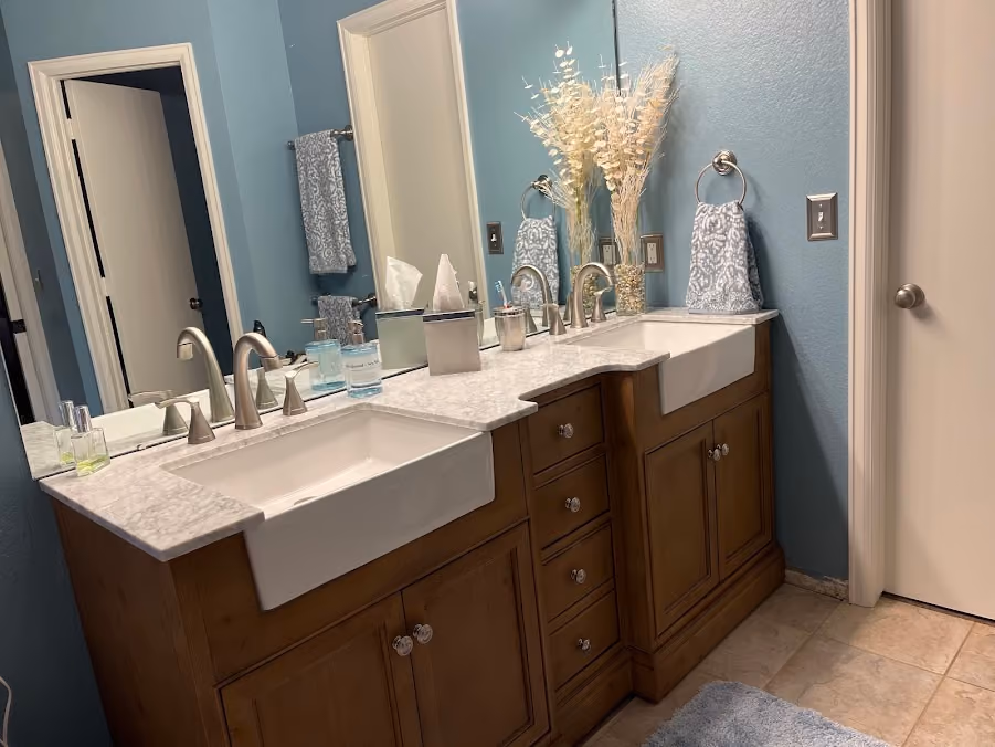 A double vanity with farmhouse sinks
