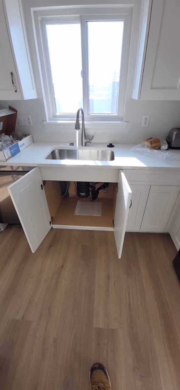 A new kitchen sink and cabinet