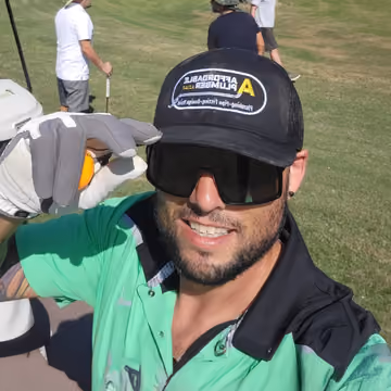 Pat Wertin, owner of Affordable Plumber CO LLC, smiling in an Affordable Plumber cap