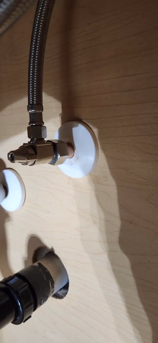 New quarter-turn shut-off valves on a wall